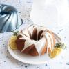imageNordic Ware Formed Orginal Bundt with Translucent Keeper 12 Cup Golden HourTwilight Blue