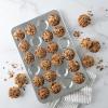 imageNordic Ware Naturals 12 Cavity Muffin Pan with HighDomed Lid24Cup Petite Muffin Pan