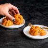 imageNordic Ware 95377 Bundtlette Pan 75th Anniversary Braided Bundt Bites Gold 35