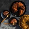 imageNordic Ware NW 95577 75th Anniversary Braided Rope Bundt Cake Pan Gold 12 Cup CapacityPan