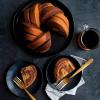 imageNordic Ware NW 95577 75th Anniversary Braided Rope Bundt Cake Pan Gold 12 Cup CapacityPan