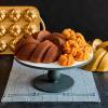 imageNordic Ware NW 95577 75th Anniversary Braided Rope Bundt Cake Pan Gold 12 Cup CapacityPan